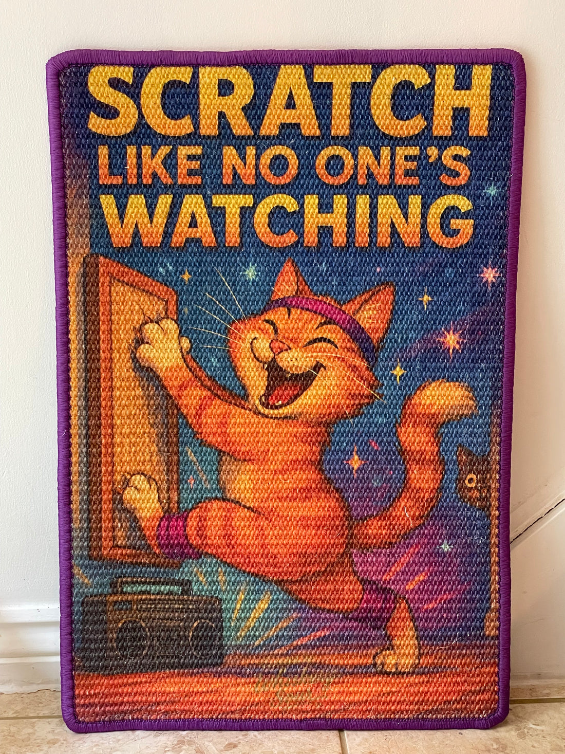 Cat scratching mat with dancing tabby and disco ball illustration