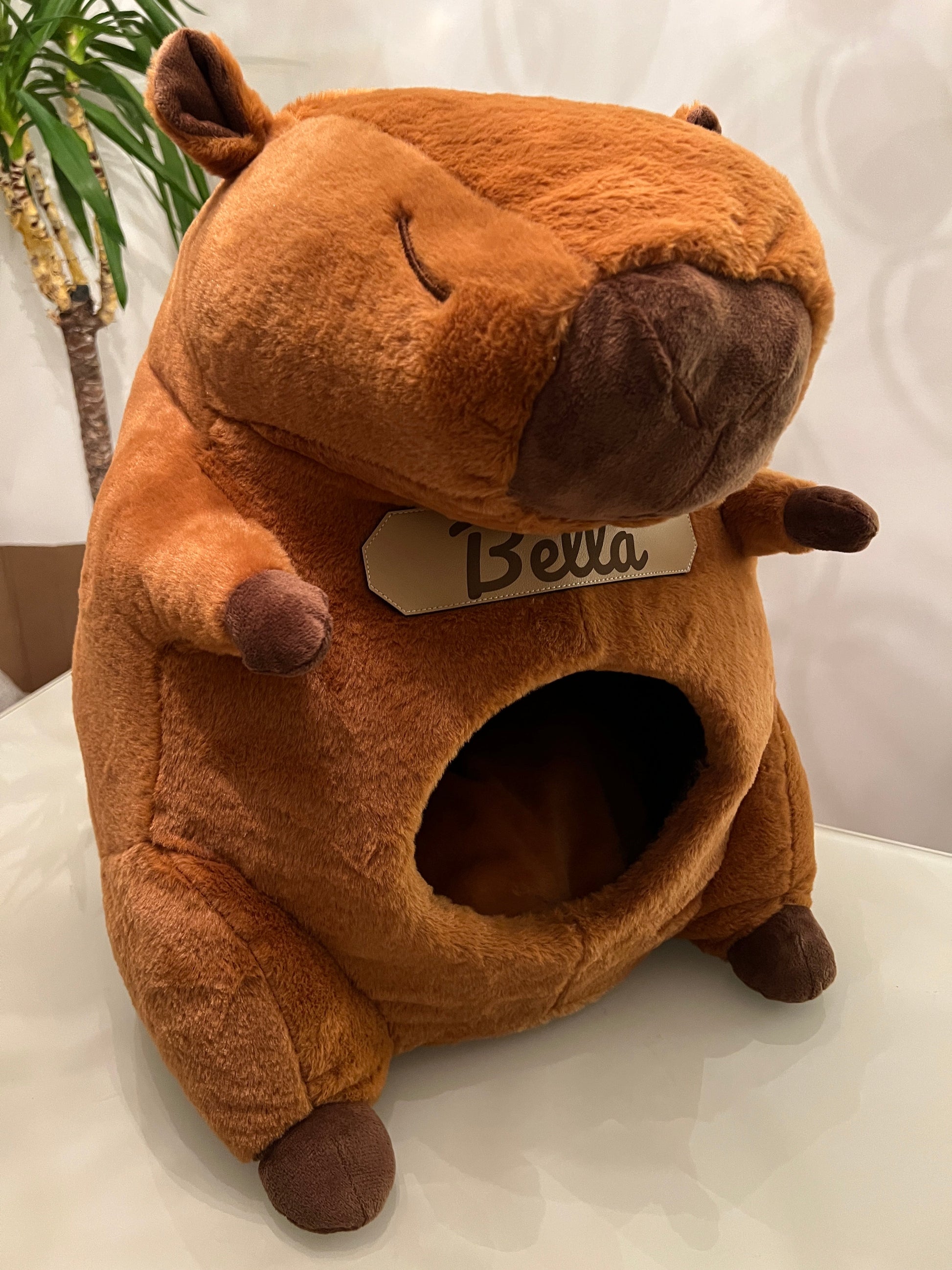 Capybara cat house with personalised beige PU leather name tag — structured cat bed that keeps its shape
